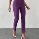 Pantalones unicolor bajo con abertura con cinturon