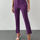 Pantalones unicolor bajo con abertura con cinturon