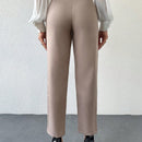 Pantalones zanahoria con bolsillo oblicuo liso