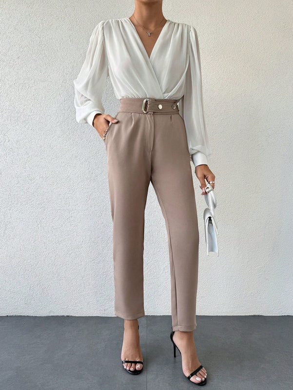Pantalones zanahoria con bolsillo oblicuo liso