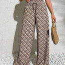 Pantalones anchos boho casuales elegantes con tejido de punto estampado, textura ahumada en la cintura con cordon decorado