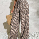 Pantalones anchos casuales y elegantes de estilo bohemio con tejido decorado de punto con diseno impreso en todo el pantalon, cintura fruncida y detalle de cordon