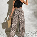 Pantalones anchos boho casuales elegantes con tejido de punto estampado, textura ahumada en la cintura con cordon decorado