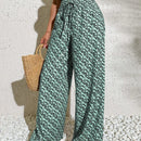 Pantalones anchos casuales y elegantes de estilo bohemio con tejido decorado de punto con diseno impreso en todo el pantalon, cintura fruncida y detalle de cordon