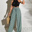 Pantalones anchos boho casuales elegantes con tejido de punto estampado, textura ahumada en la cintura con cordon decorado