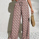 Pantalones anchos boho casuales elegantes con tejido de punto estampado, textura ahumada en la cintura con cordon decorado