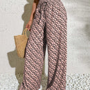 Pantalones anchos boho casuales elegantes con tejido de punto estampado, textura ahumada en la cintura con cordon decorado