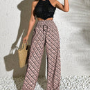 Pantalones anchos casuales y elegantes de estilo bohemio con tejido decorado de punto con diseno impreso en todo el pantalon, cintura fruncida y detalle de cordon