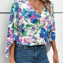 Clasi Blusa holgada de verano para mujer con estampado floral, manga acampanada y cuello en V