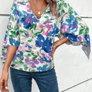 Clasi Blusa holgada de verano para mujer con estampado floral, manga acampanada y cuello en V