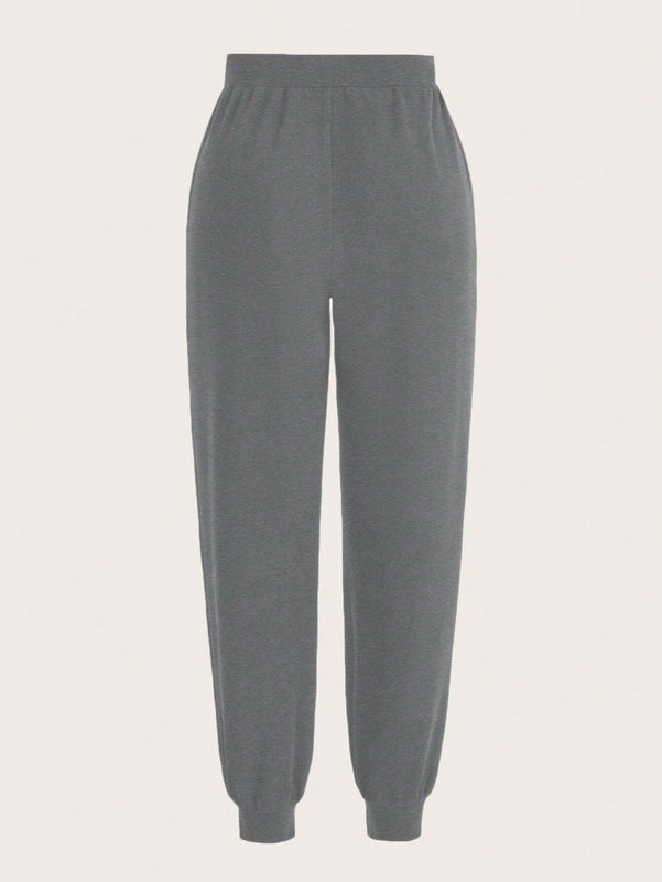 Slayr Pantalones casuales negros para mujer con pierna conica y bolsillos para uso diario