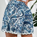 Essnce Pantalones cortos tejidos casuales para vacaciones de verano para mujeres con ribete de pompones, parches estampados y cinturon tejido, pantalones cortos estilo hawaiano, pantalones cortos graficos, ropa de verano