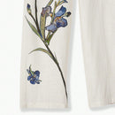 Motf premium pantalones de bolsillo inclinado con estampado floral y costura frontal