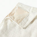 Motf premium pantalones de bolsillo inclinado con estampado floral y costura frontal
