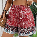 VCAY Pantalones cortos holgados para mujer con patron de corte panuelo y cintura ajustable