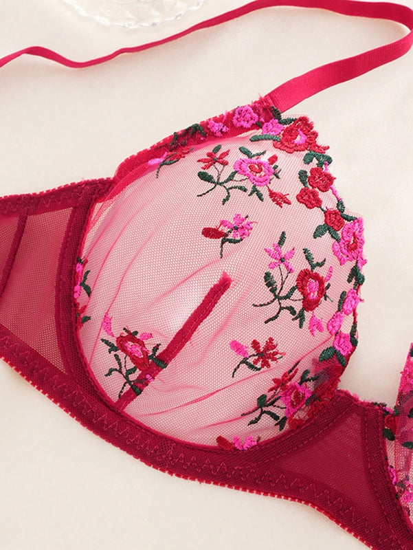 Conjunto de ropa interior sexy para mujer en color burdeos, sosten con push-up y cuello en v profundo con encaje y con aros, junto con las Tangas