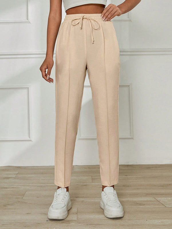 Pantalones casuales para mujer con cintura elastica con cordon, ajuste regular y bolsillos inclinados de unicolor