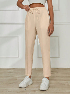 Pantalones casuales para mujer con cintura elastica con cordon, ajuste regular y bolsillos inclinados de unicolor