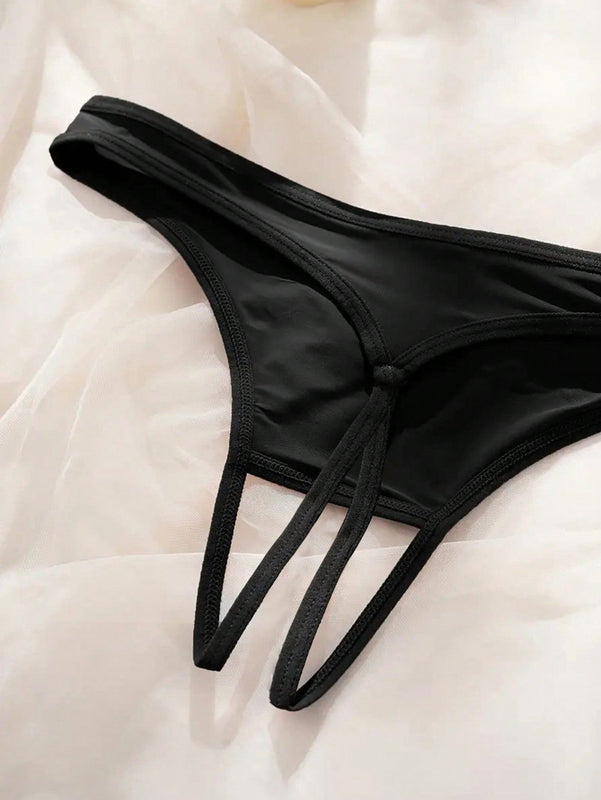 Sexy Tangas sin costuras para damas con estampado de letras blancas y entrepierna abierta