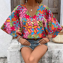 Camisa de mujer suelta con hombro caido y manga 3/4 con estampado aleatorio
