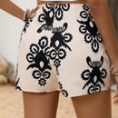 VCAY Shorts de vacaciones de verano para mujer con estampado completo y diseno cruzado