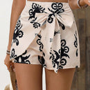 VCAY Shorts de vacaciones de verano para mujer con estampado completo y diseno cruzado