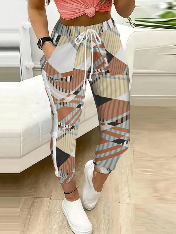 Unity Pantalones casuales con bolsillos y cordon en la cintura con estampado completo