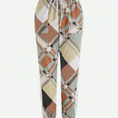 Unity Pantalones casuales con bolsillos y cordon en la cintura con estampado completo