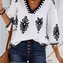 Camisa de mujer con cuello en V y estampado aleatorio con ajuste holgado