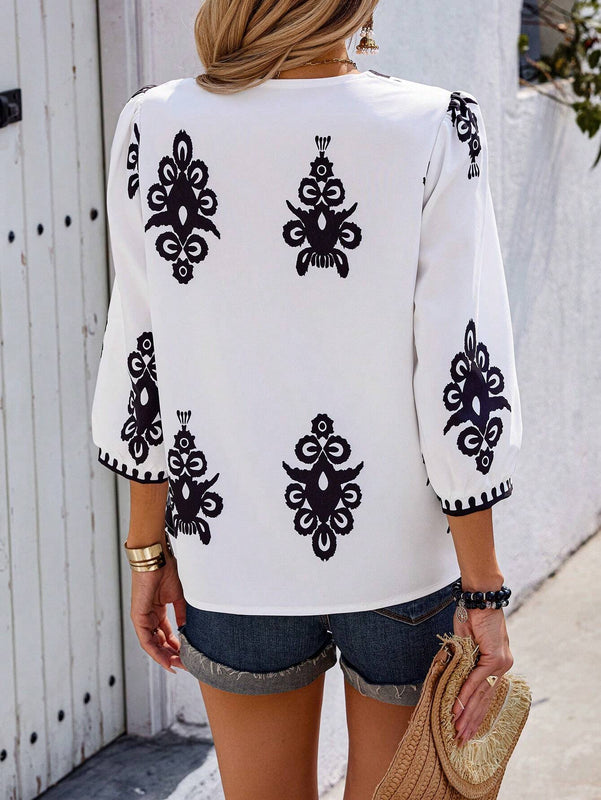 Camisa de mujer con cuello en V y estampado aleatorio con ajuste holgado