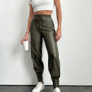 Pantalones con punos elasticos y cintura con cordon de color liso para mujer