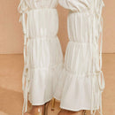 Haute Pantalones blancos con fruncidos, cintura con cordon y varios niveles