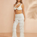Haute Pantalones blancos con fruncidos, cintura con cordon y varios niveles