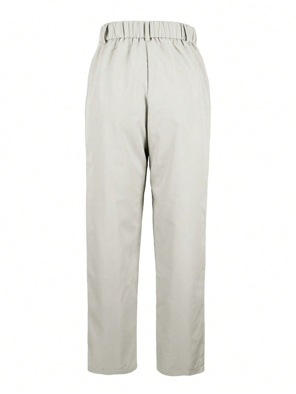 Pantalones largos casuales con botones y bolsillos de unicolor