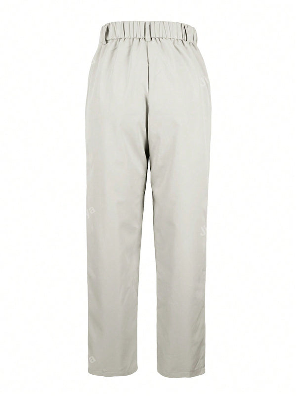 Pantalones largos casuales con botones y bolsillos de unicolor