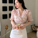DAZY Camisa estampada con flores de manga corta, cuello en V, cruzada y con nudo en la cintura, ideal para un aspecto elegante de verano para mujer