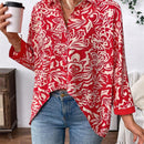 Camisa informal de manga larga para mujer con botones frontales y estampado completo con dobladillo asimetrico