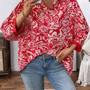 Camisa informal de manga larga para mujer con botones frontales y estampado completo con dobladillo asimetrico