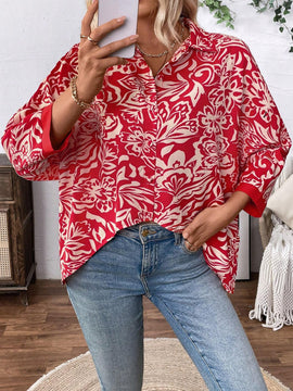Camisa informal de manga larga para mujer con botones frontales y estampado completo con dobladillo asimetrico
