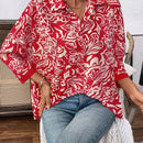 Camisa informal de manga larga para mujer con botones frontales y estampado completo con dobladillo asimetrico