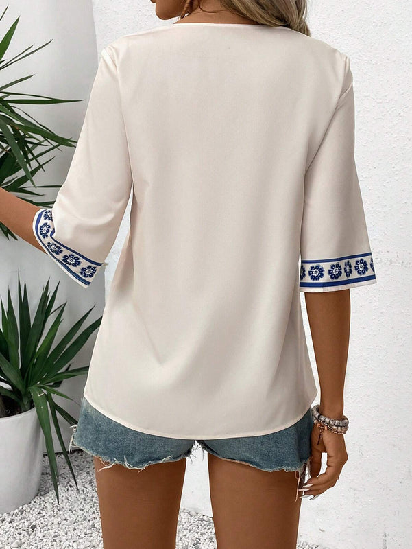 Camisa casual de vacaciones para mujer con cuello en V, manga media y ajuste regular