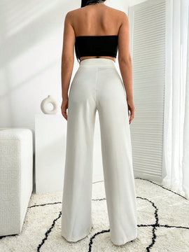Pantalon palazzo de pierna ancha blanco con detalle de boton