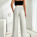 Pantalon palazzo de pierna ancha blanco con detalle de boton