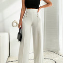 Pantalon palazzo de pierna ancha blanco con detalle de boton