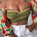 Top corto fuera del hombro con mangas de lampara y diseno de flores, perfecto para vacaciones de moda femenina