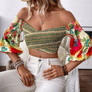 Top corto fuera del hombro con mangas de lampara y diseno de flores, perfecto para vacaciones de moda femenina