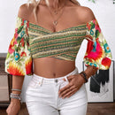 Top corto fuera del hombro con mangas de lampara y diseno de flores, perfecto para vacaciones de moda femenina