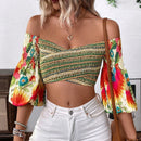 Top corto fuera del hombro con mangas de lampara y diseno de flores, perfecto para vacaciones de moda femenina