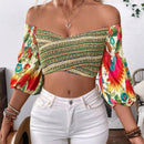 Top corto fuera del hombro con mangas de lampara y diseno de flores, perfecto para vacaciones de moda femenina