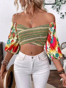 Top corto fuera del hombro con mangas de lampara y diseno de flores, perfecto para vacaciones de moda femenina
